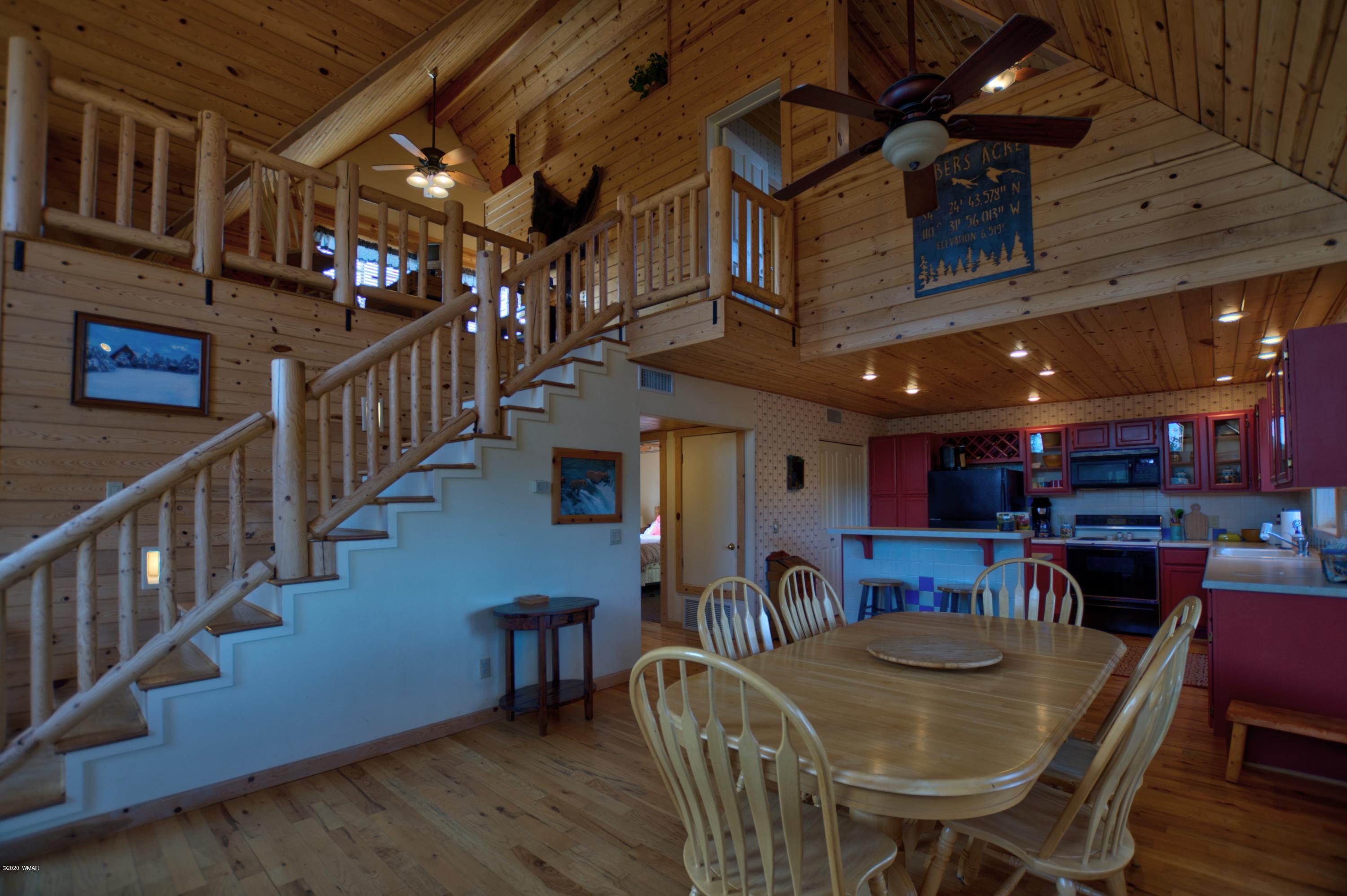 2957 Ranch House Road Overgaard, AZ 85933 - Photo 2 of 24 a view of a dining room with furniture