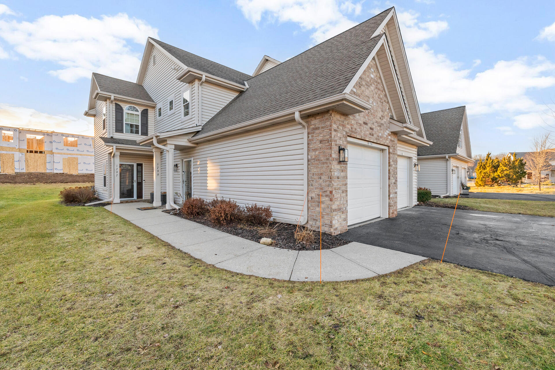 1799 Woodland Way Slinger, WI 53086 - Photo 2 of 25 2-Exterior_1799 Woodland Way