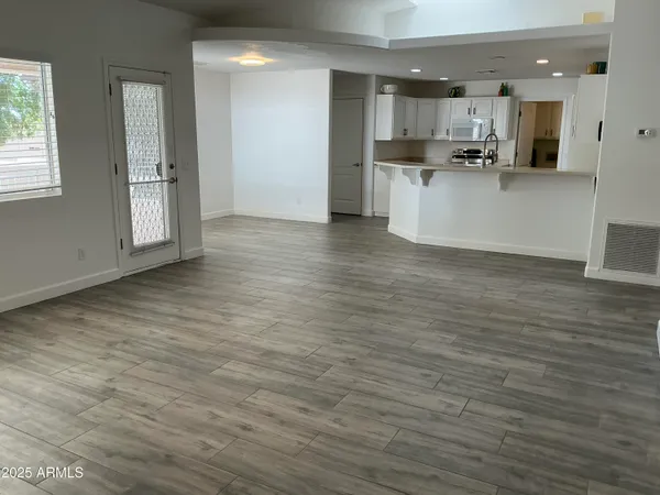 wooden floor and windows in a room