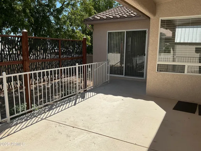 a view of balcony with small garden