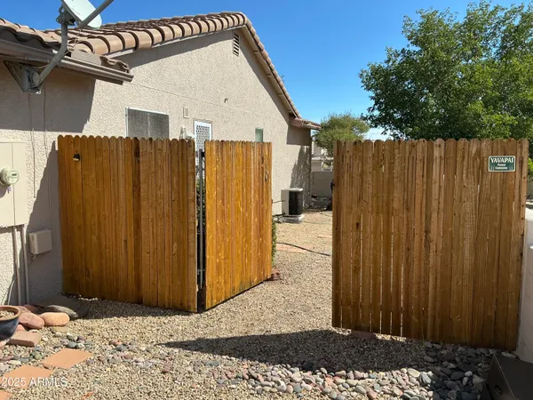 a view of a yard with trees