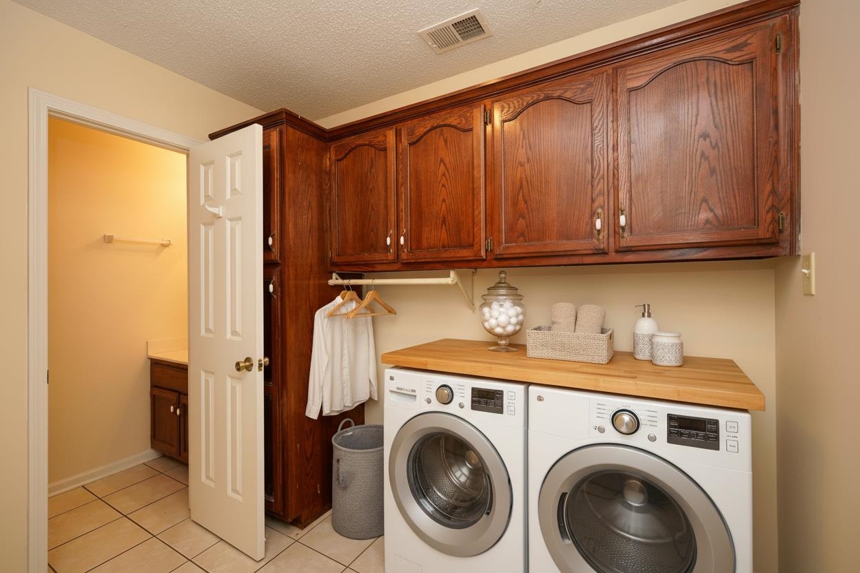 242 Timothy Road Atoka, TN 38004 - Photo 16 of 25 a utility room with dryer and washer