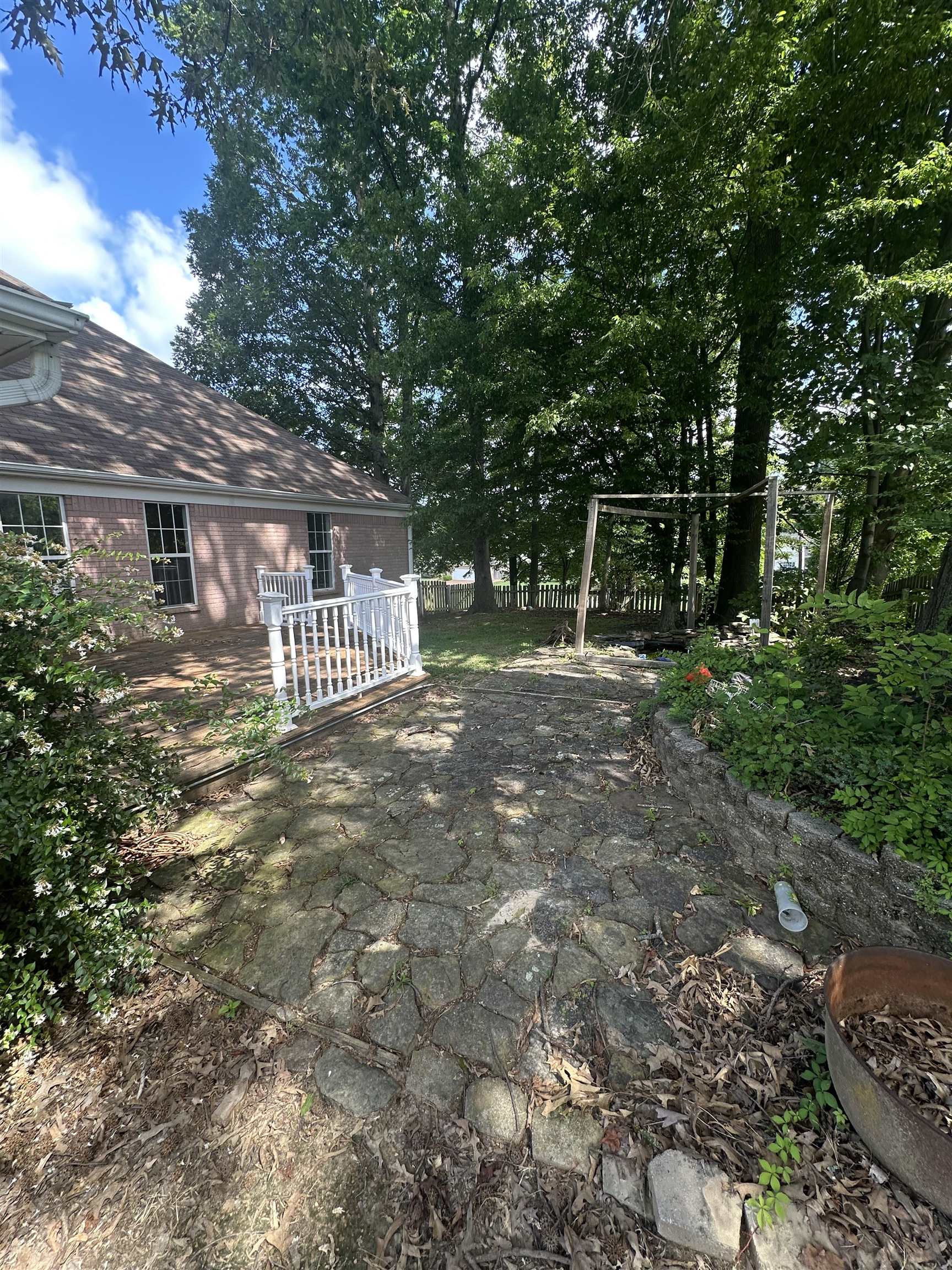 242 Timothy Road Atoka, TN 38004 - Photo 6 of 25 a backyard of a house with lots of green space