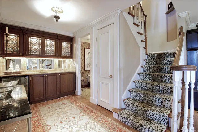 a kitchen with a refrigerator and a stove