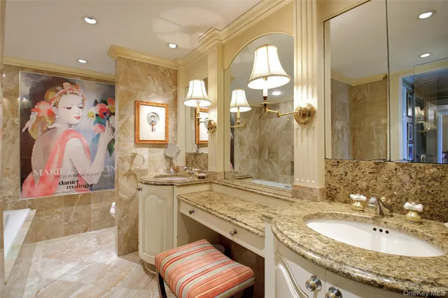 a bathroom with a granite countertop sink mirror and double