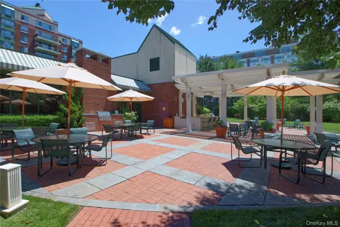 a view of a patio with chairs and a patio