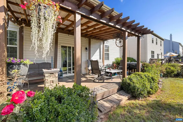 a view of a chairs and table in the patio