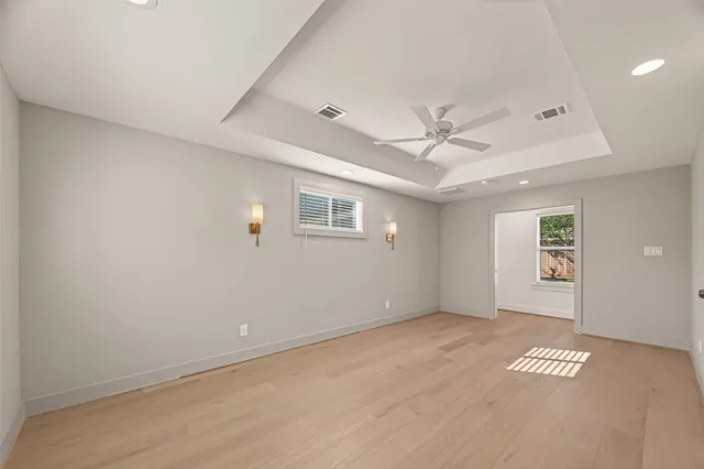 a bathroom with double sink and a mirror