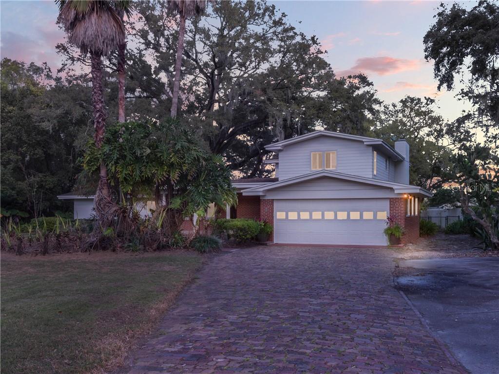 8 Interlaken Road Orlando, FL 32804 - Photo 1 of 1 a sign that is on the side of the road