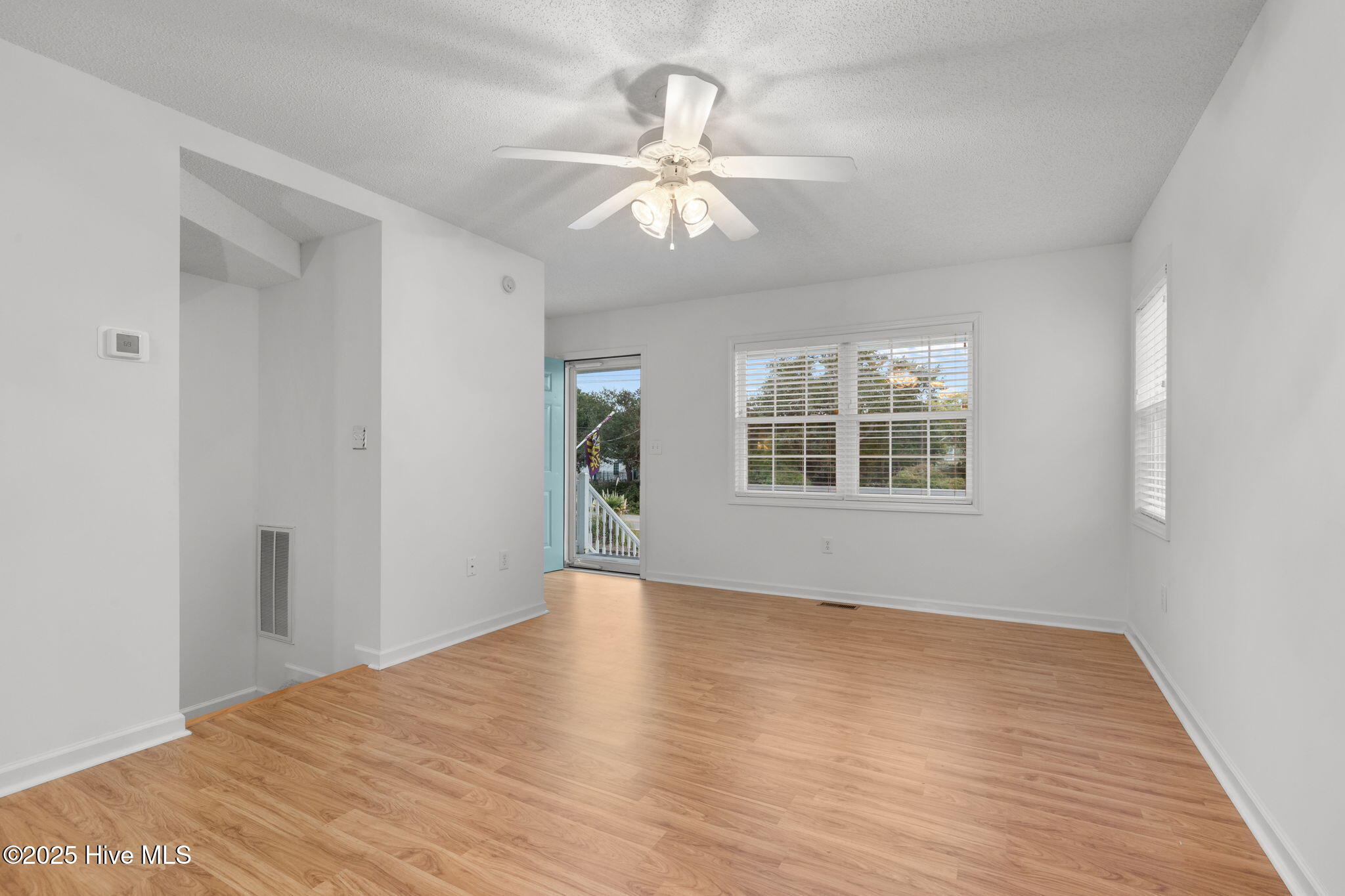 2225 Lennoxville Road Beaufort, NC 28516 - Photo 22 of 35 Living room with wood laminate
