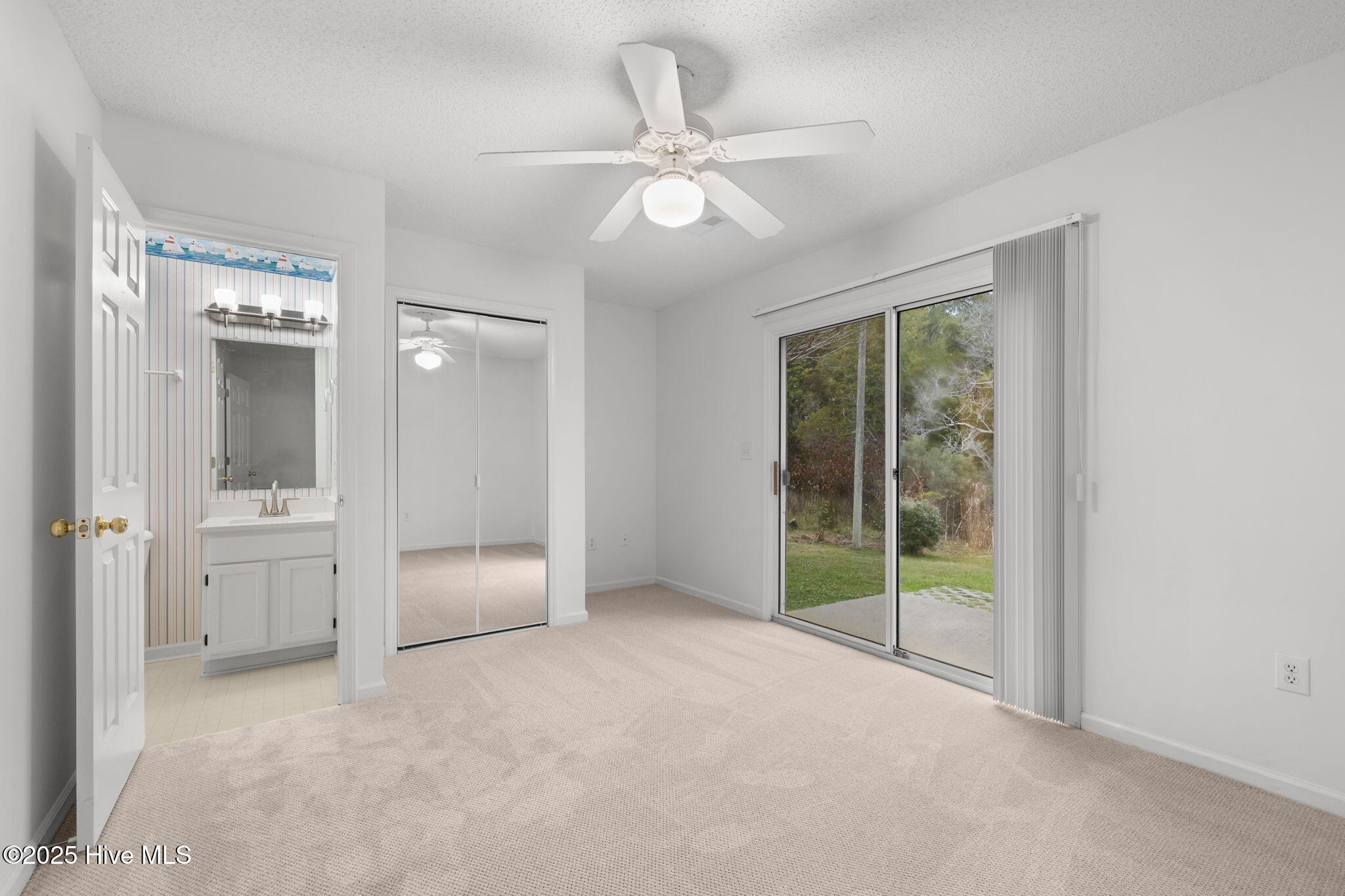 2225 Lennoxville Road Beaufort, NC 28516 - Photo 25 of 35 Bedroom with en suite bath ground level