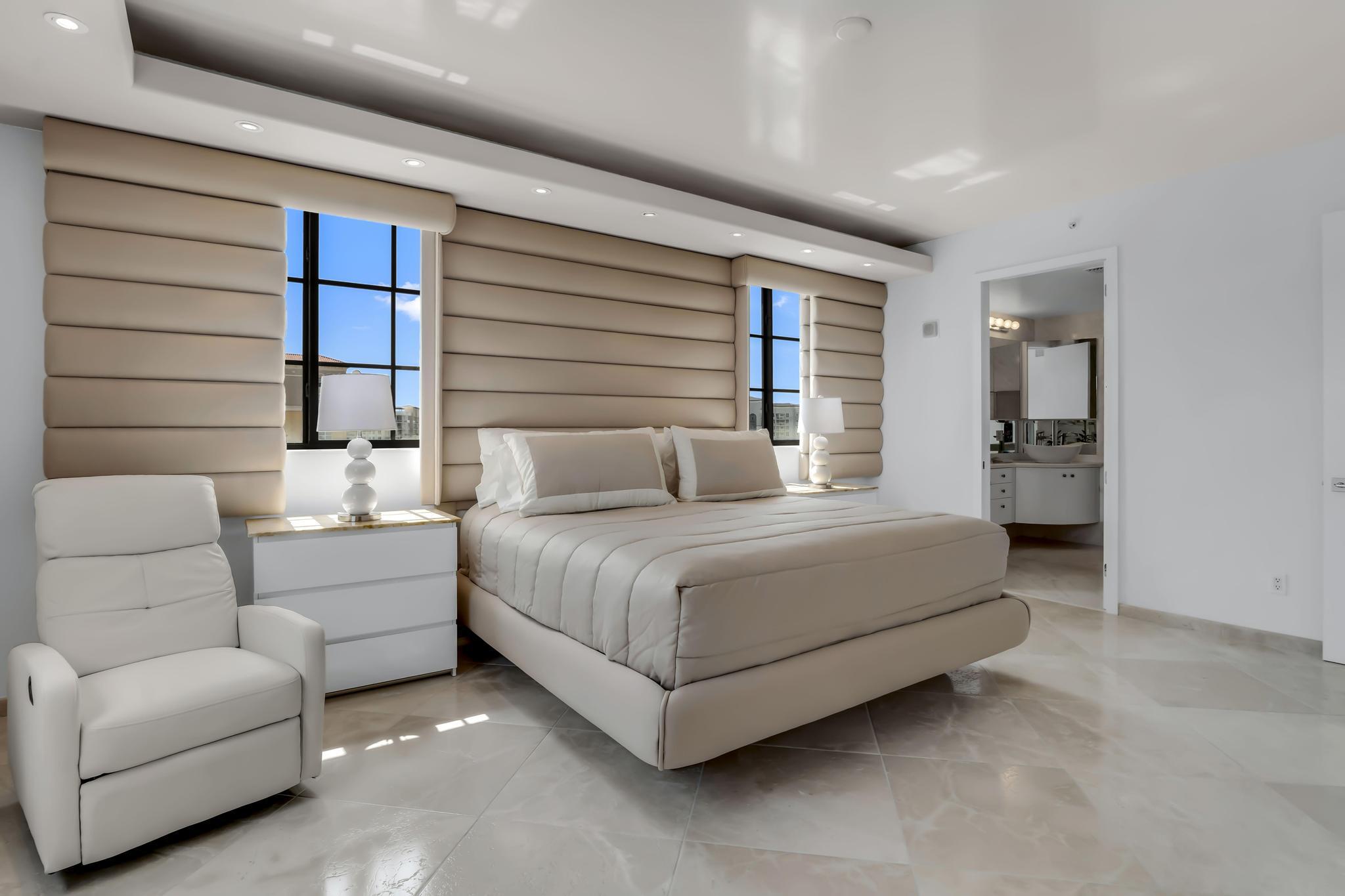 233 South Federal Highway, Unit 709 Boca Raton, FL 33432 - Photo 18 of 64 a bedroom with a bed couch and a dresser