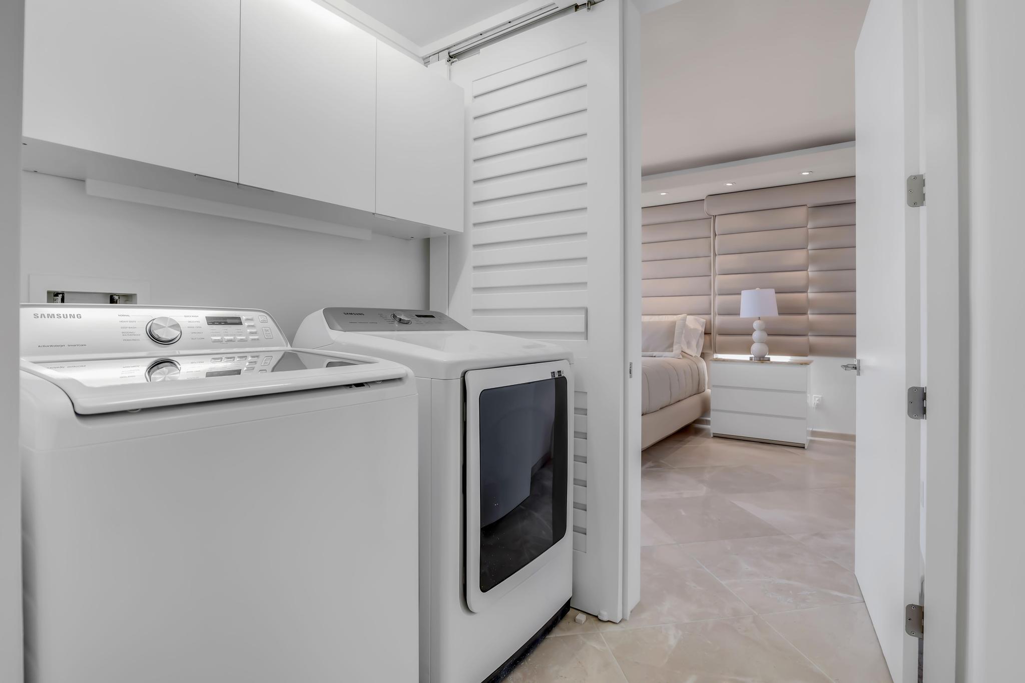 233 South Federal Highway, Unit 709 Boca Raton, FL 33432 - Photo 28 of 64 a utility room with dryer and washer