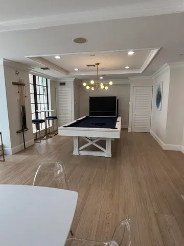 a workspace with furniture and wooden floor