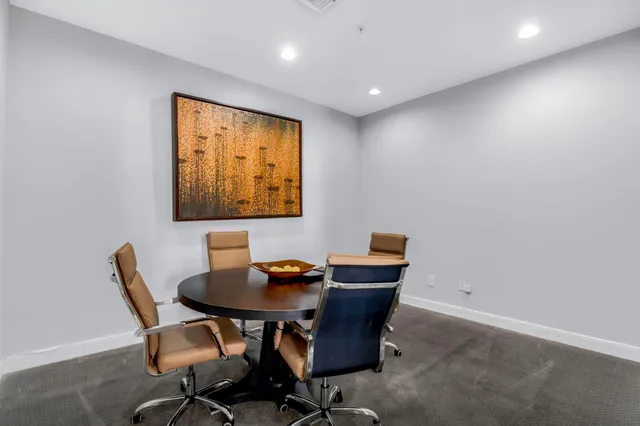 a swimming pool with outdoor seating and yard