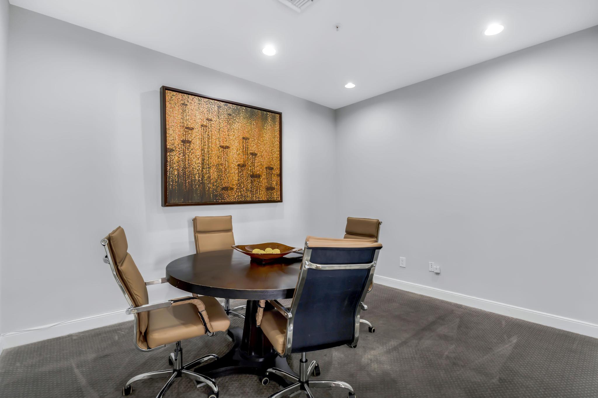 233 South Federal Highway, Unit 709 Boca Raton, FL 33432 - Photo 40 of 64 a workspace with furniture and wooden floor