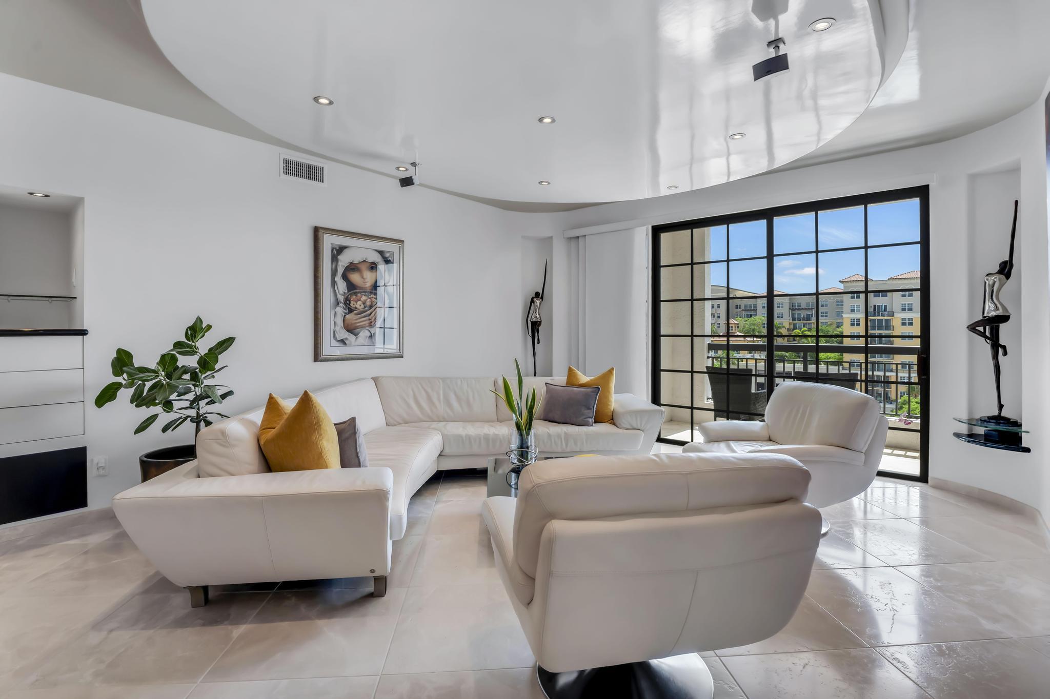 233 South Federal Highway, Unit 709 Boca Raton, FL 33432 - Photo 46 of 64 a living room with furniture and a large window