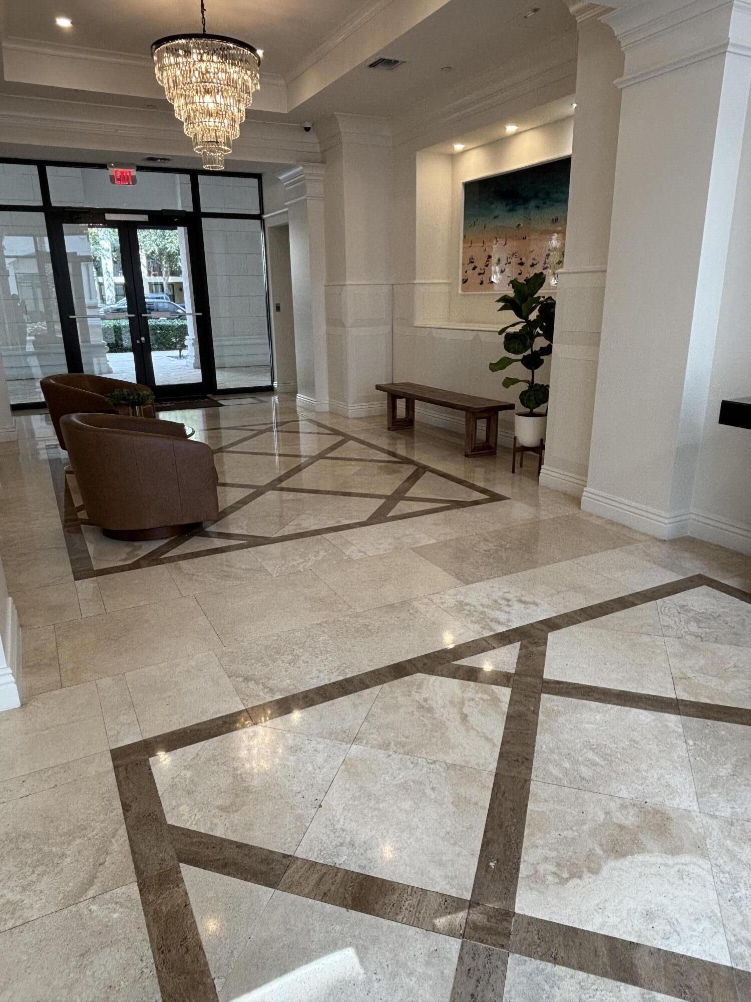 233 South Federal Highway, Unit 709 Boca Raton, FL 33432 - Photo 61 of 64 a view of living room with furniture and a chandelier