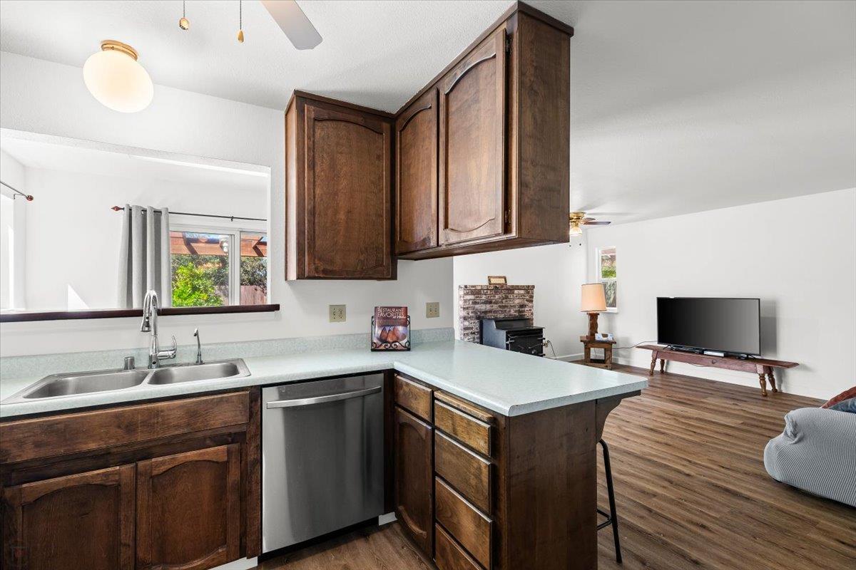 185 East Wyman Road French Camp, CA 95231 - Photo 13 of 44 a kitchen with a sink cabinets and wooden floor