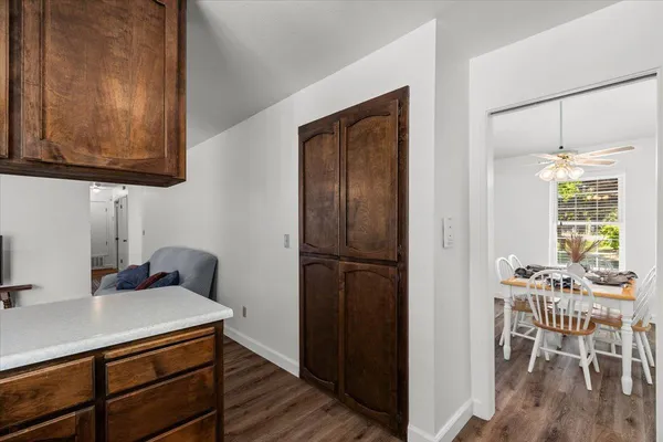 a kitchen with a table and chairs