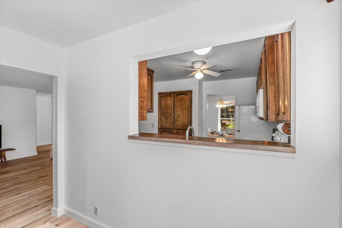 185 East Wyman Road French Camp, CA 95231 - Photo 22 of 44 hallway with mirror and window