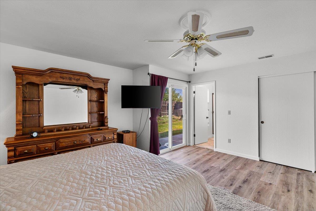 185 East Wyman Road French Camp, CA 95231 - Photo 30 of 44 a bedroom with a bed and a flat screen tv