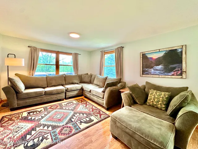 a living room with furniture and a couch