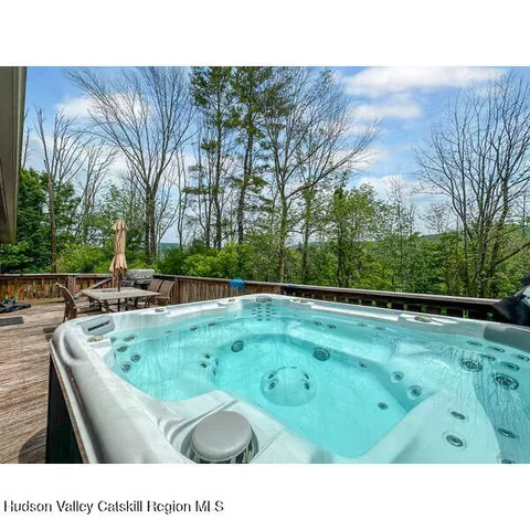 a view of a back yard from a balcony