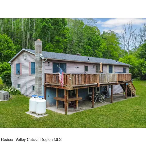 a picture of a bathroom with a shower