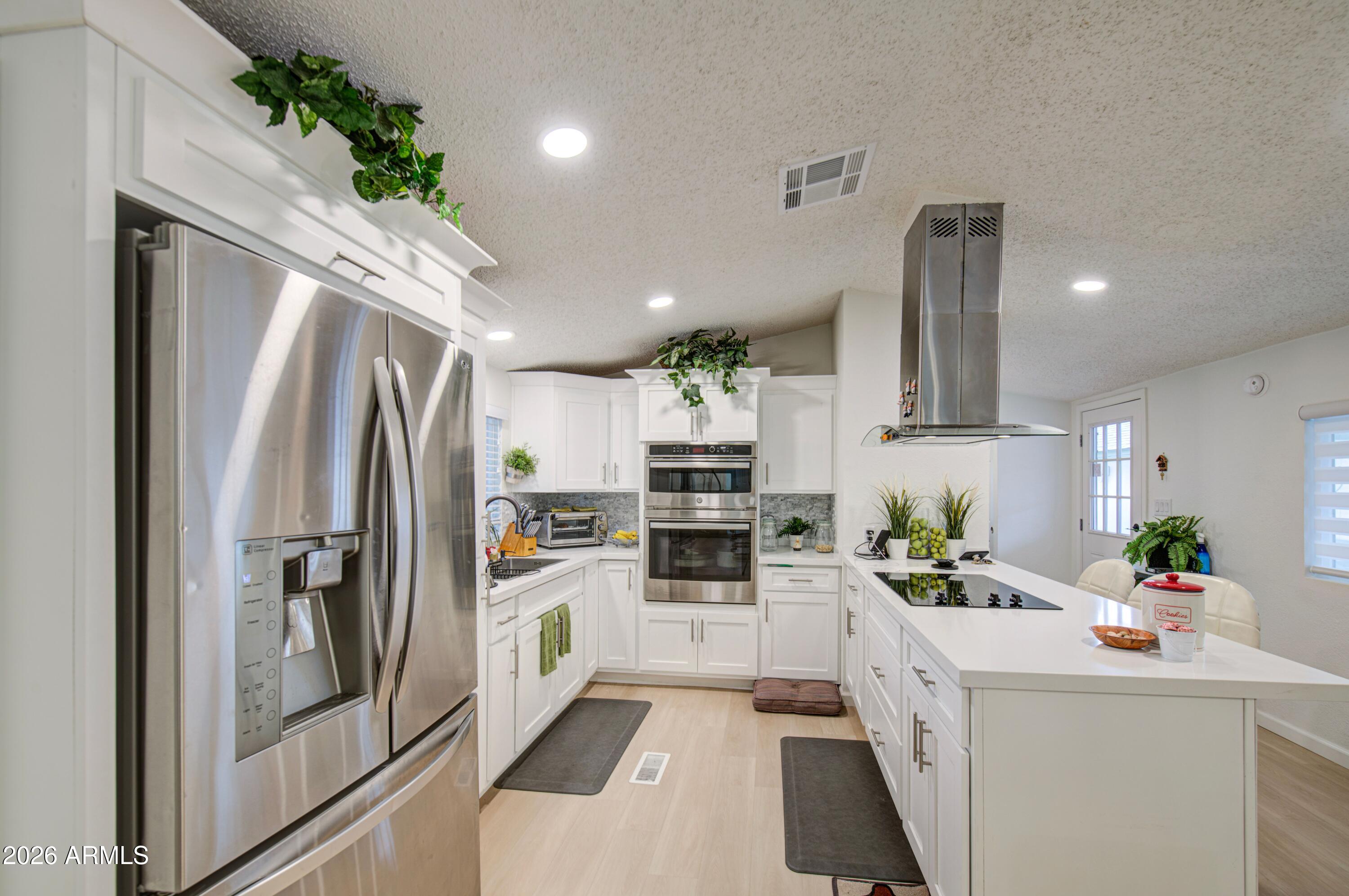 2000 South Apache Road, Unit 61 Buckeye, AZ 85326 - Photo 3 of 11 Clemen kitchen 2