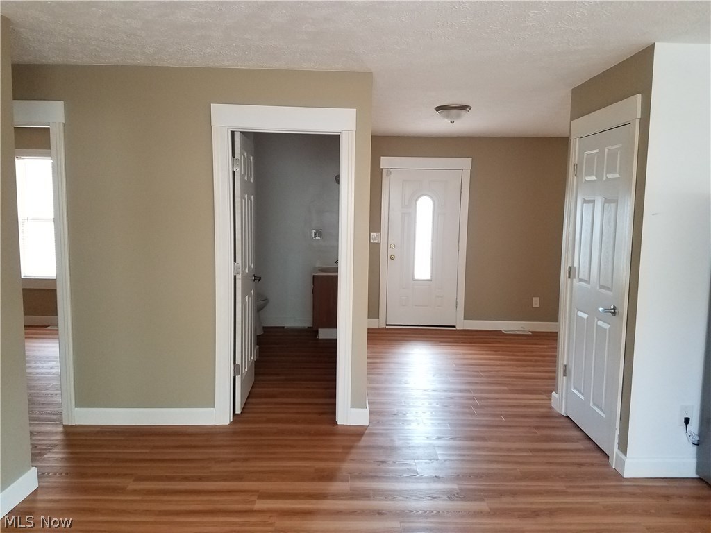 75 East Ohio Avenue Rittman, OH 44270 - Photo 8 of 17 view from dining room / family towards front door