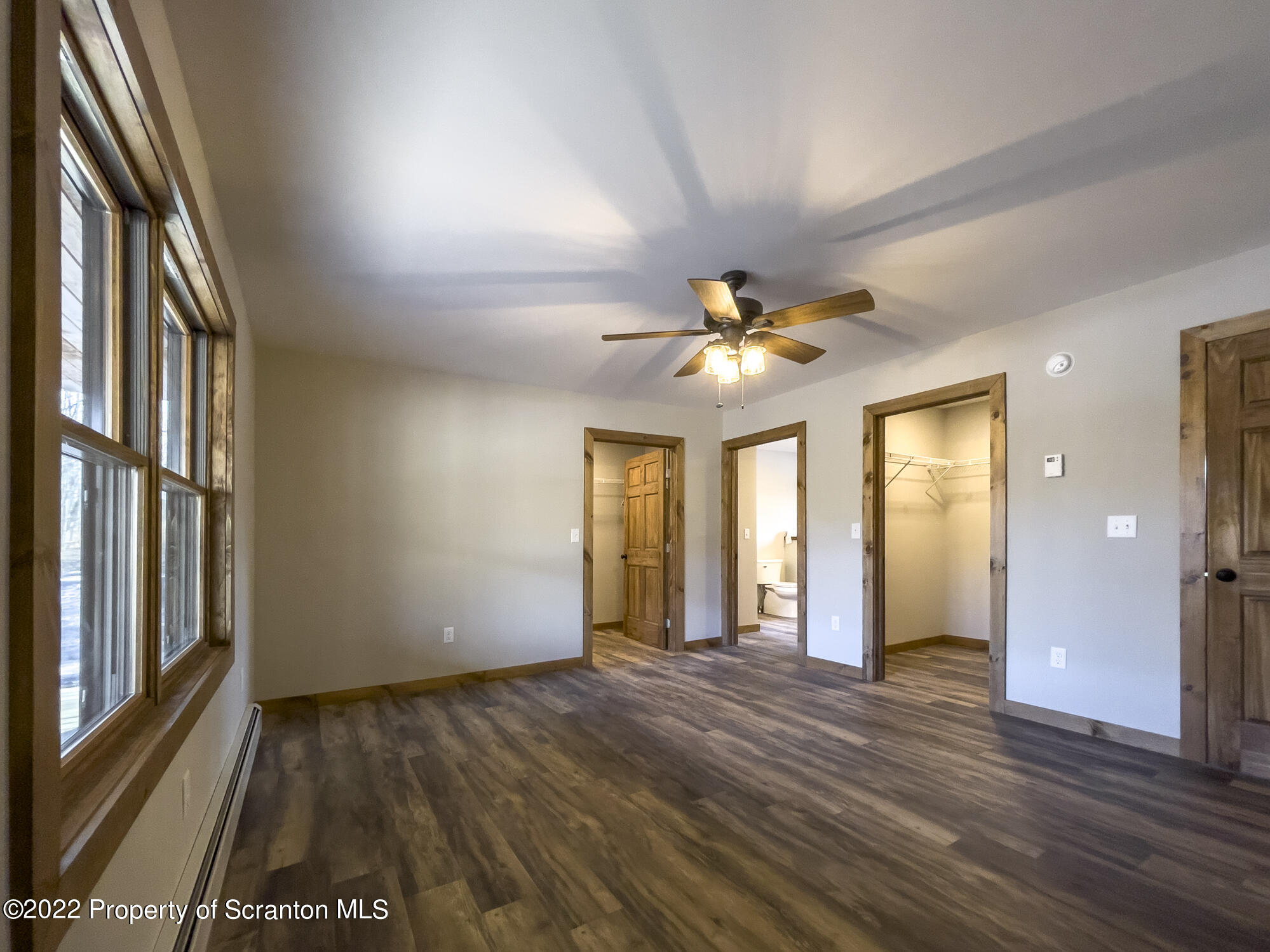 311 Jubinsky Road Waymart, PA 18472 - Photo 13 of 89 wooden floor in an empty room with a window