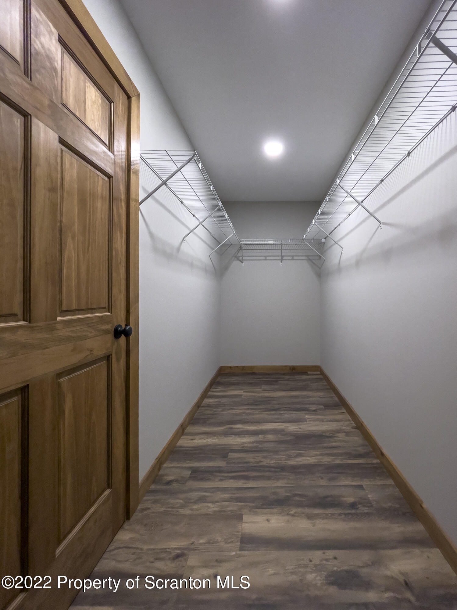 311 Jubinsky Road Waymart, PA 18472 - Photo 51 of 89 a view of a hallway with wooden floor and staircase