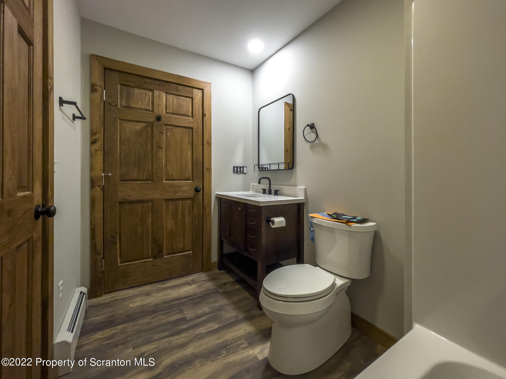 311 Jubinsky Road Waymart, PA 18472 - Photo 54 of 89 a bathroom with a toilet and a sink