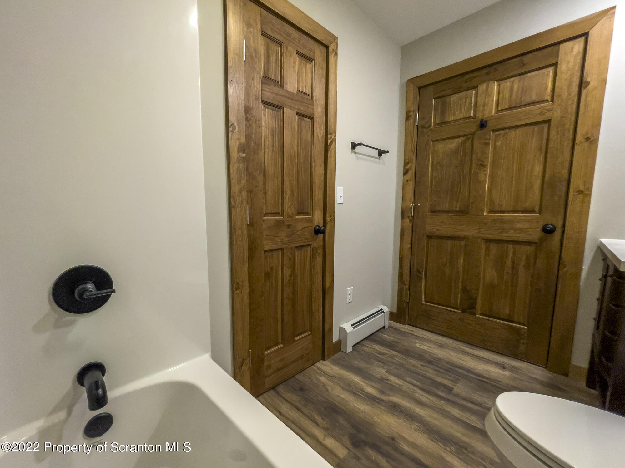 311 Jubinsky Road Waymart, PA 18472 - Photo 55 of 89 a bathroom with a sink a toilet and shower