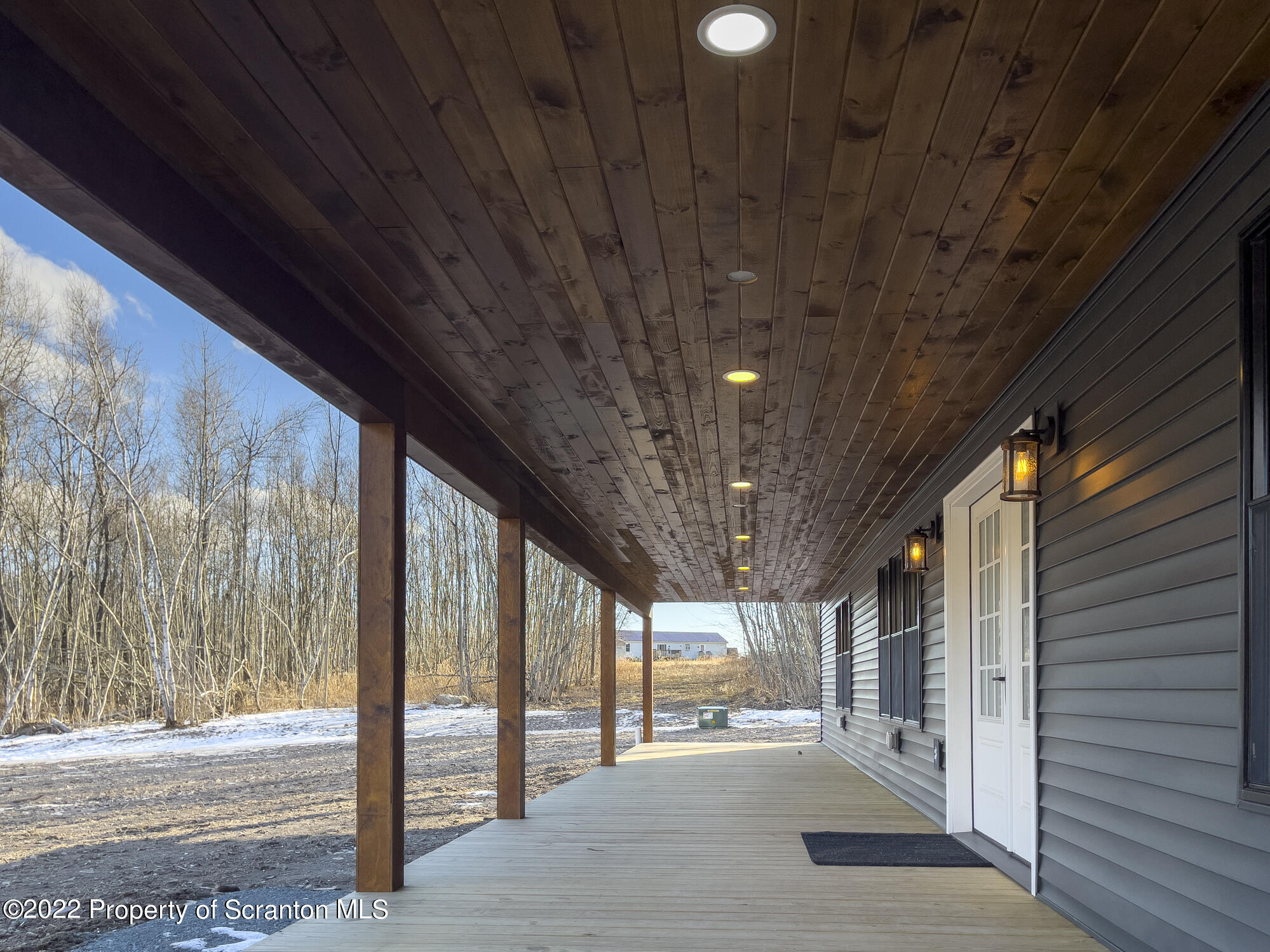 311 Jubinsky Road Waymart, PA 18472 - Photo 64 of 89 a view of a porch with a table and chairs