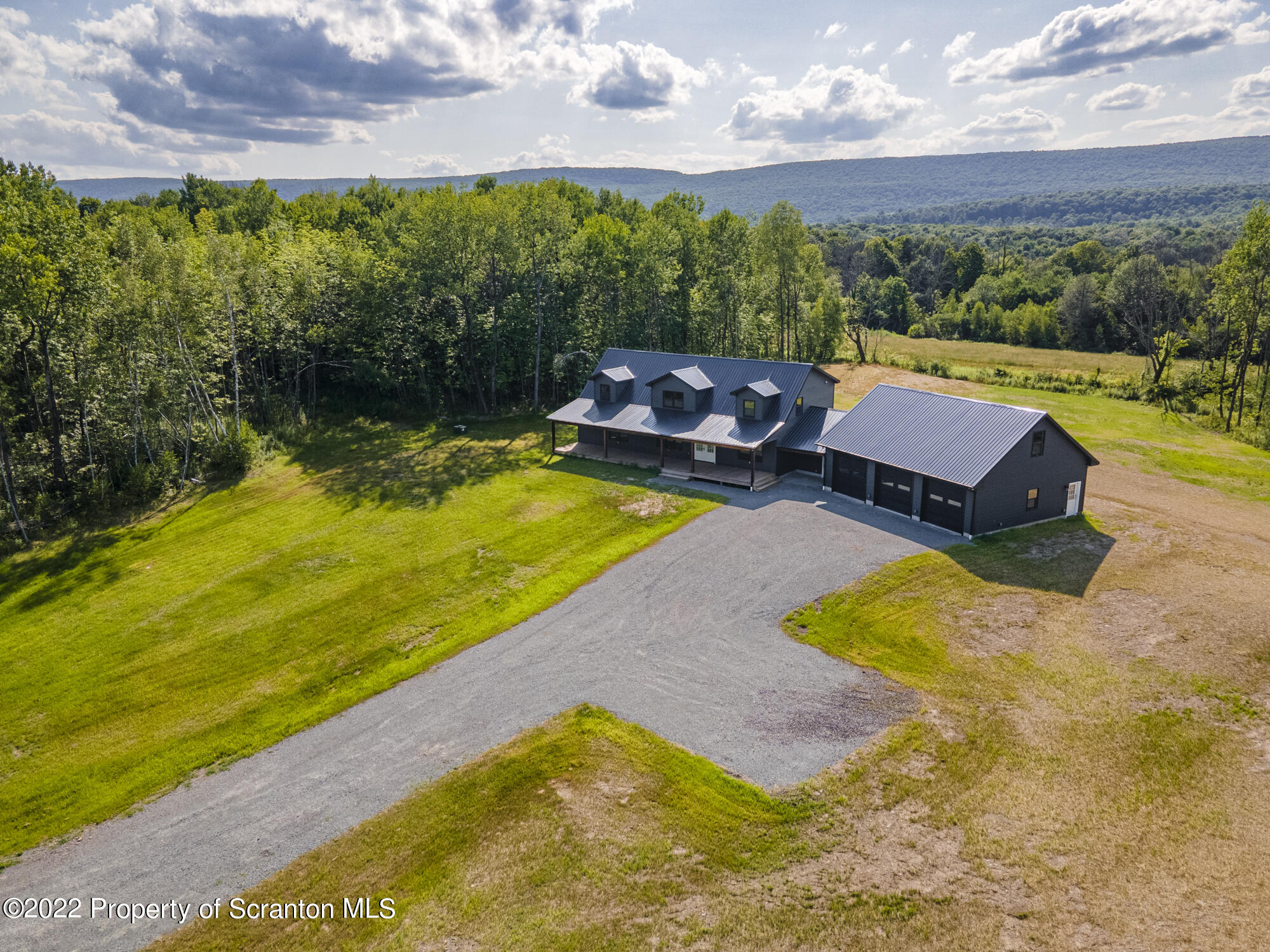 311 Jubinsky Road Waymart, PA 18472 - Photo 78 of 89 a view of a swimming pool with a patio