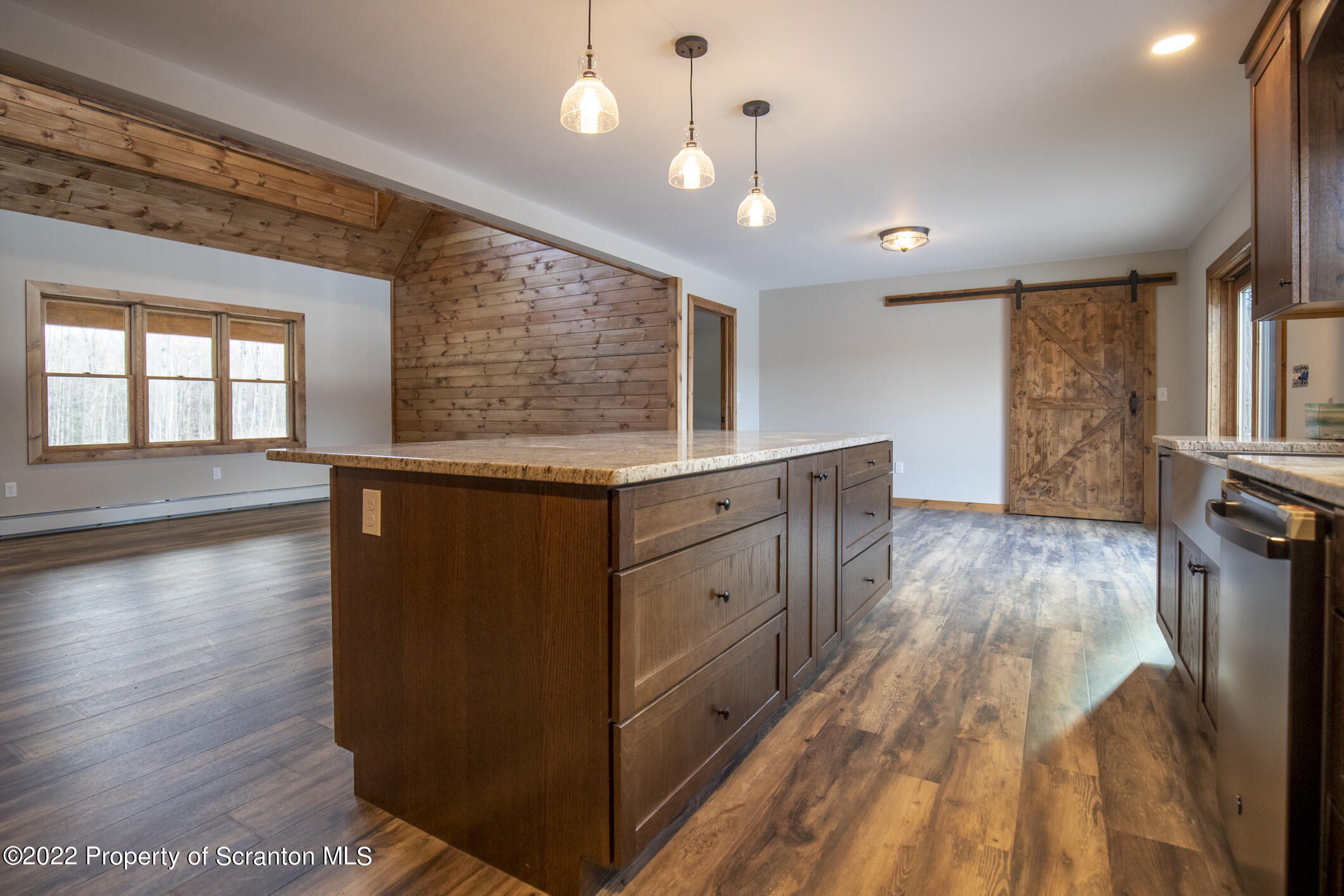 311 Jubinsky Road Waymart, PA 18472 - Photo 9 of 89 a kitchen with stainless steel appliances granite countertop a stove and a wooden floors