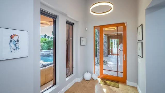 wooden floor in an empty room and a window