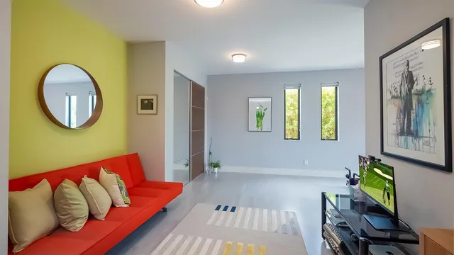 a living room with furniture and a window