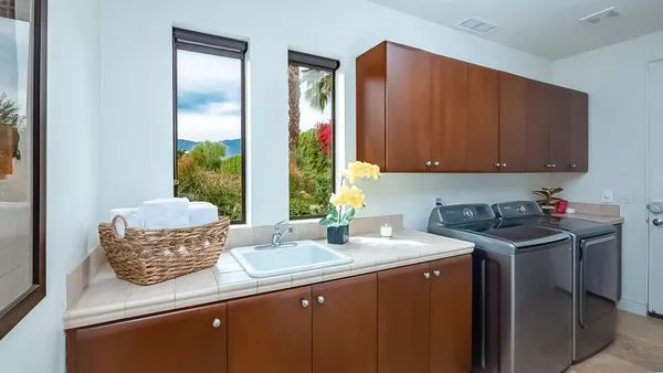 a kitchen with a sink and a cabinets