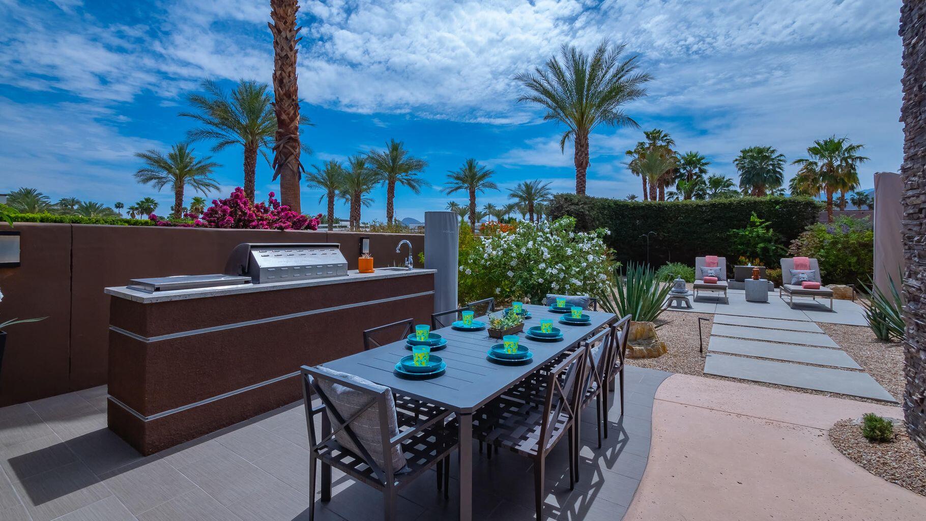 2 Dominion Court Rancho Mirage, CA 92270 - Photo 30 of 40 a view of a chairs and table in patio