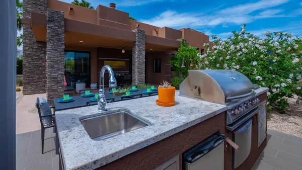a view of house with outdoor seating space