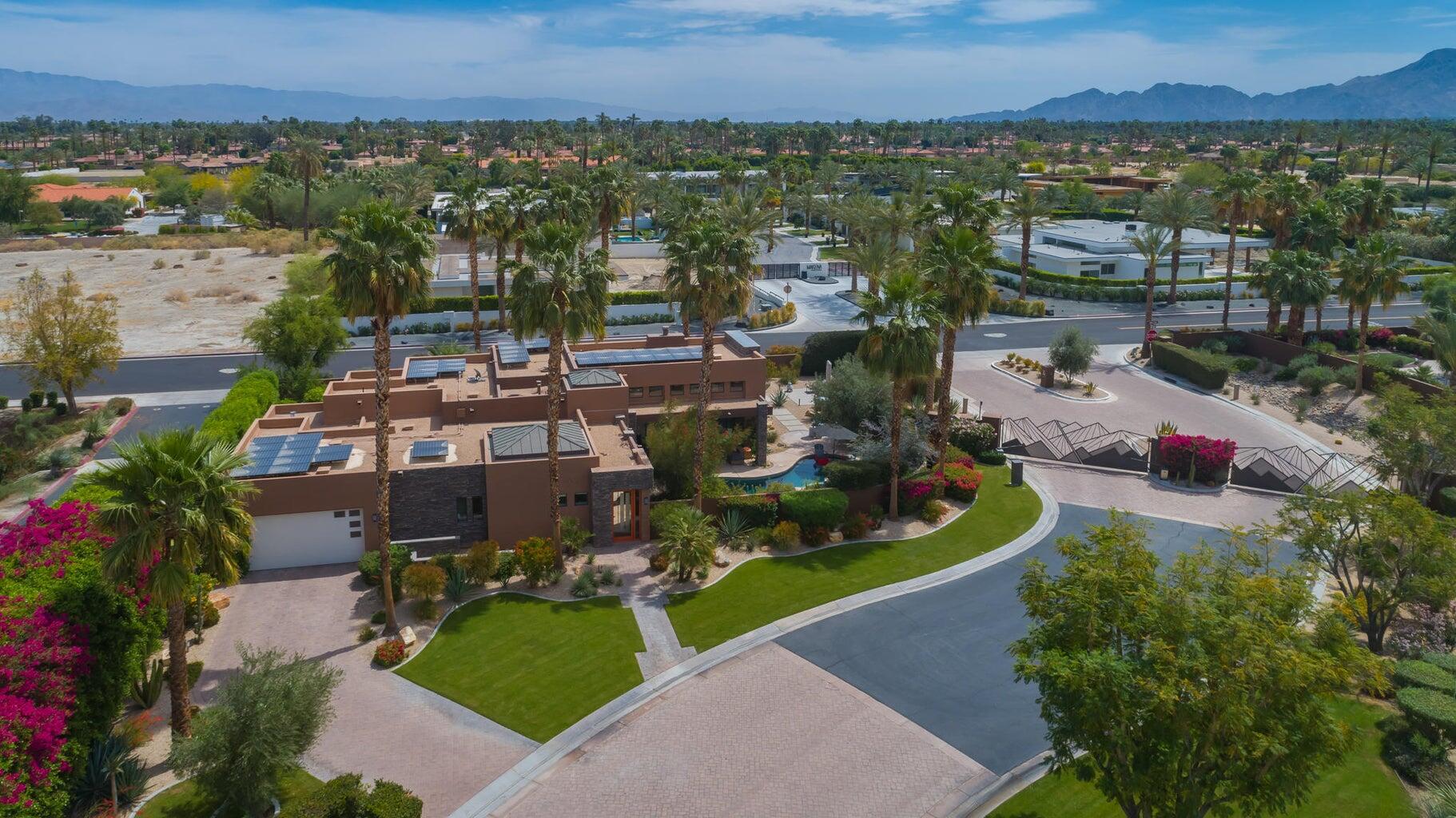 2 Dominion Court Rancho Mirage, CA 92270 - Photo 39 of 40 an aerial view of a house with a garden and lake view