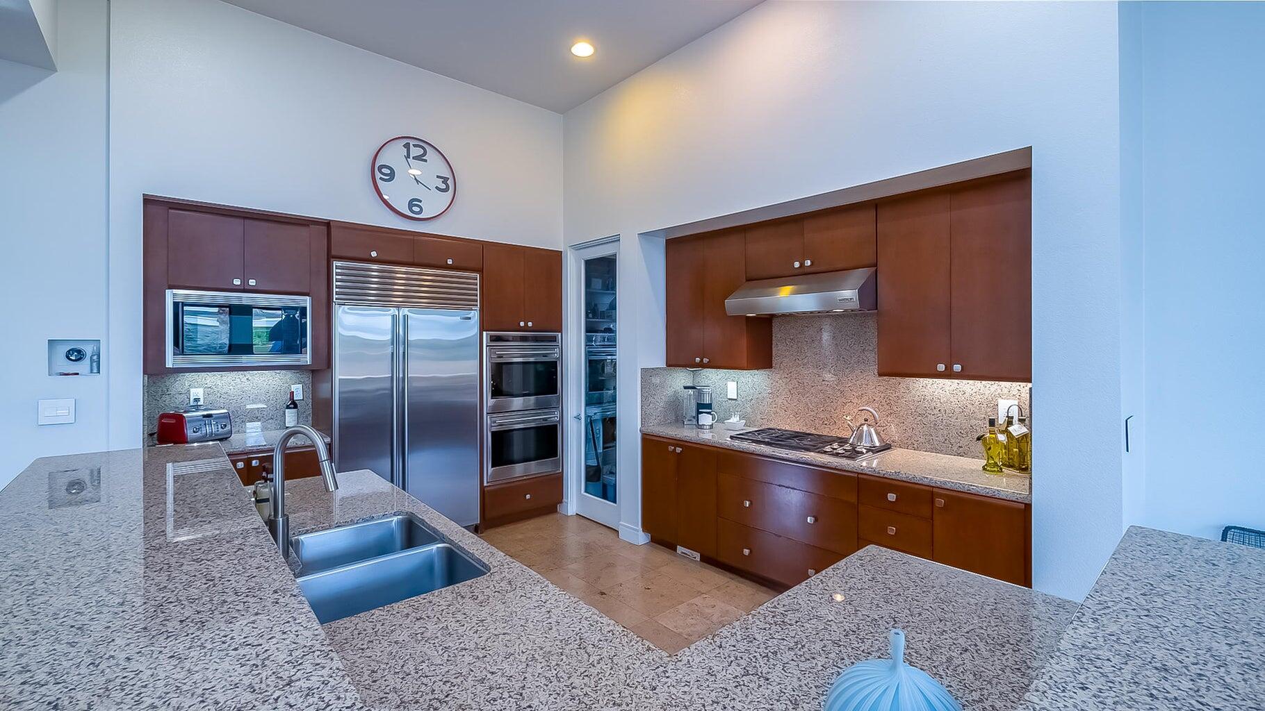 2 Dominion Court Rancho Mirage, CA 92270 - Photo 6 of 40 a living room with furniture and a flat screen tv