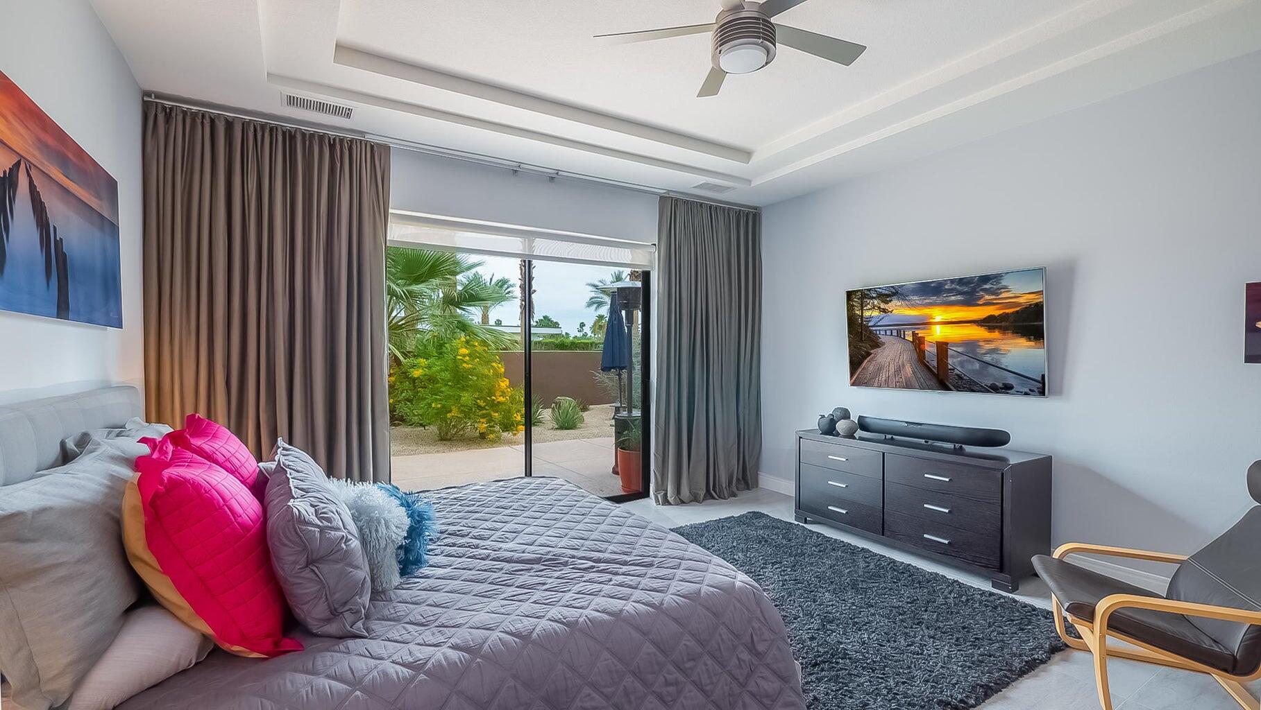 2 Dominion Court Rancho Mirage, CA 92270 - Photo 10 of 40 a bedroom with a bed and a television