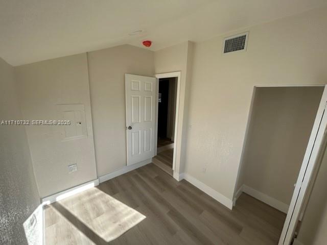 3529 Northwest 34th Street, Unit BACK Miami, FL 33142 - Photo 12 of 17 a view of an empty room