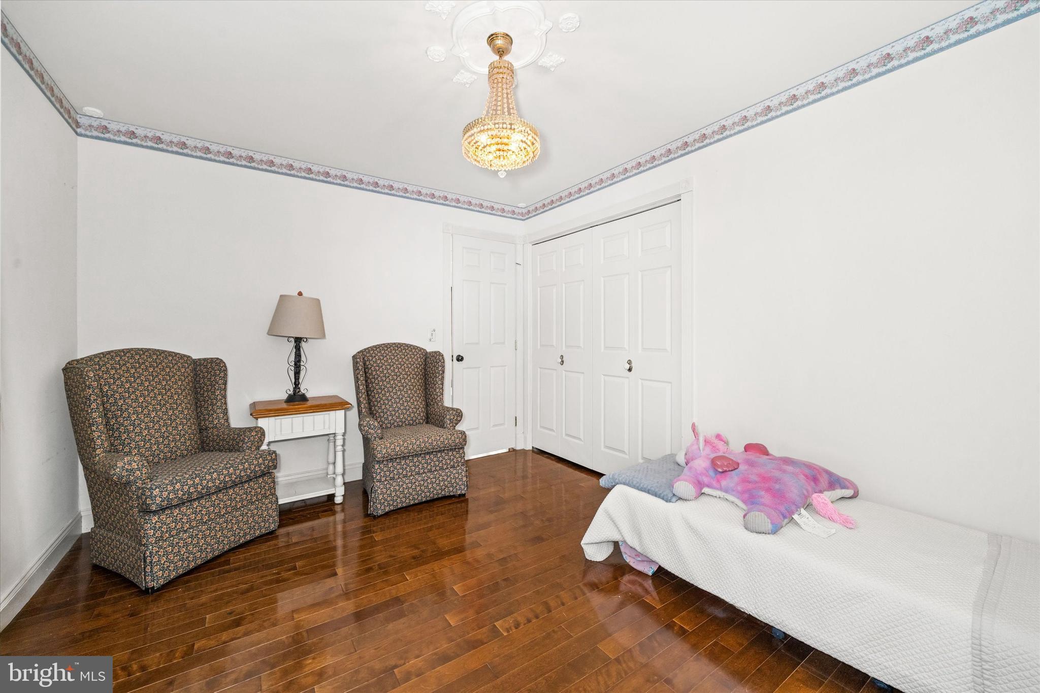 22892 Angola Road East Lewes, DE 19958 - Photo 24 of 48 a living room with furniture and a couch
