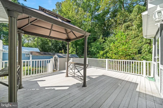 a view of outdoor space with deck and backyard