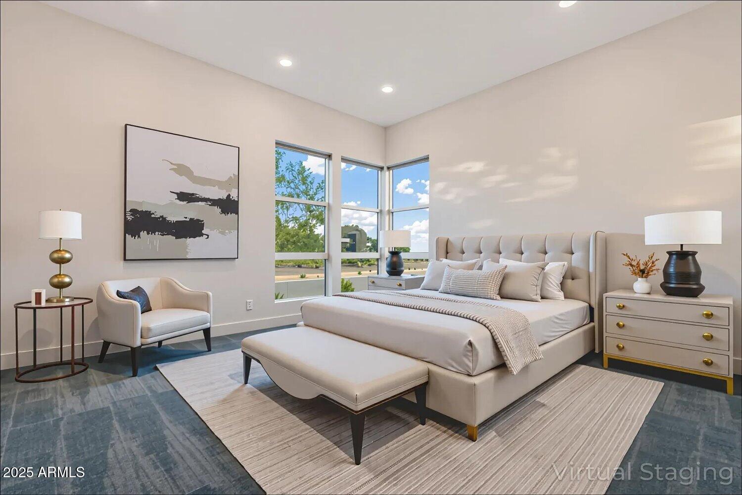 9527 South 13th Way Phoenix, AZ 85042 - Photo 17 of 44 a bedroom with a large bed and a couch